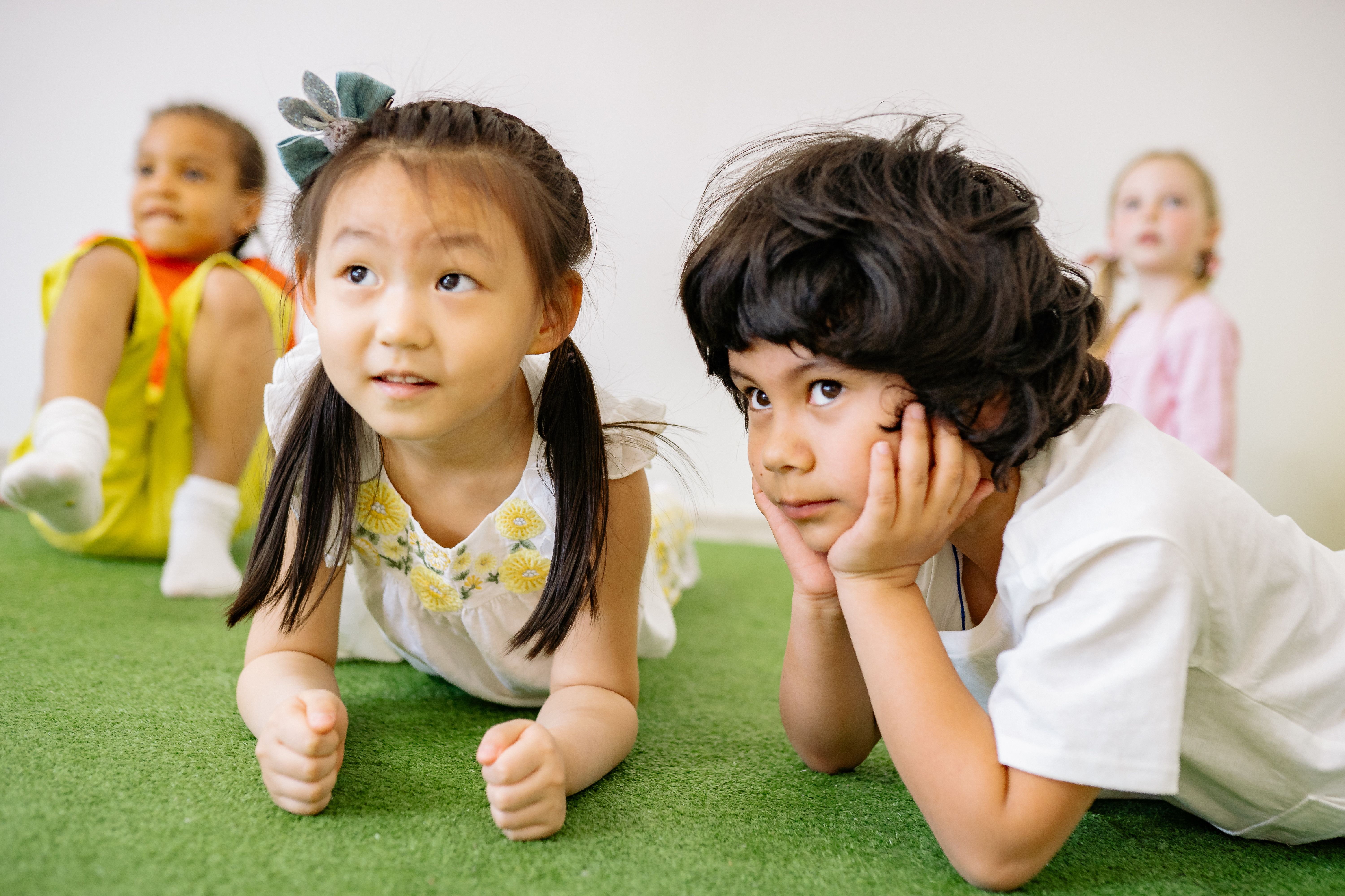 Preschool children participating in a classroom activity
